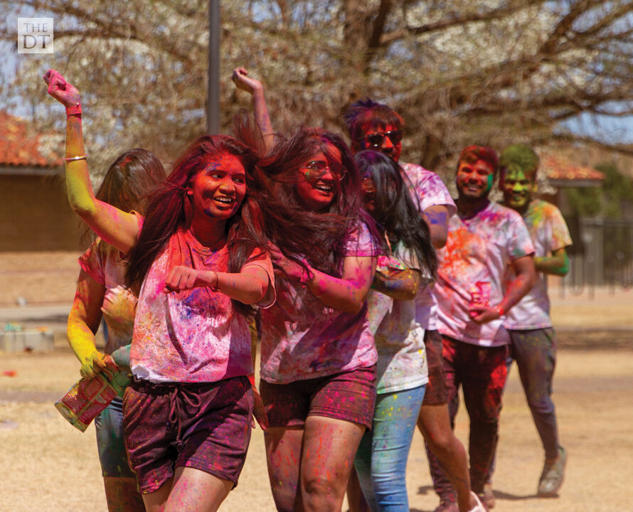 Dancing in the celebration of Holi
